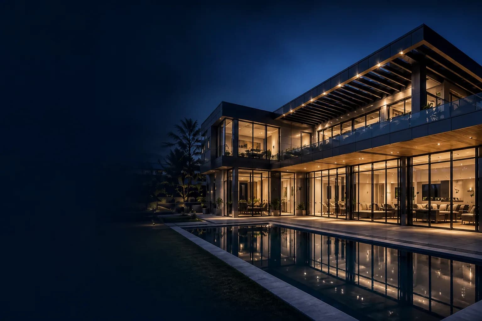 Villa contemporaine aux façades vitrées et menuiseries aluminium, éclairée au crépuscule